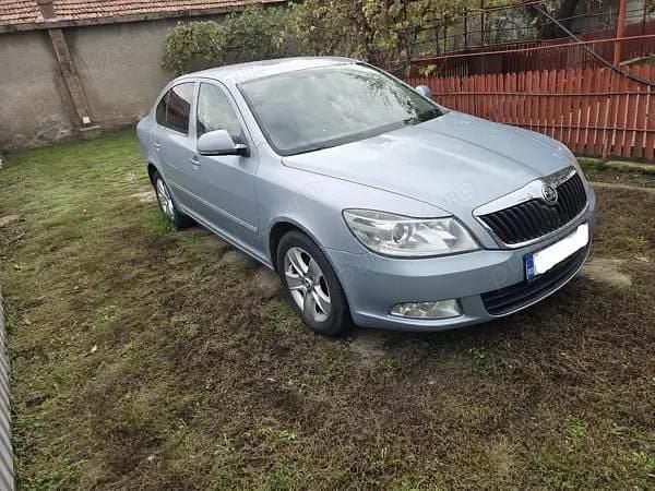 Gri Utilizat 2010 Skoda Octavia Berlinǎ | 4.300 EUR (Preț OK) - Imagine 1/4
