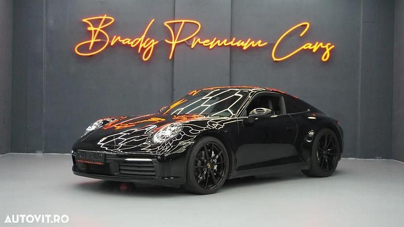 Culoarenegru Utilizat 2020 Porsche 911 Carrera Coupe | 99.900 EUR - Imagine 1/4