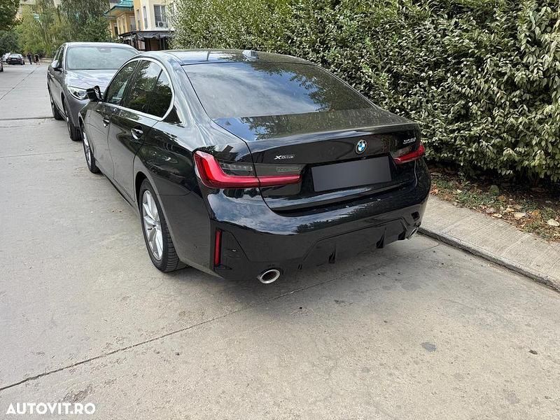 Culoarenegru Utilizat 2022 BMW 330 Sport Line Berlinǎ | 36.000 EUR (Preț OK) - Imagine 1/4