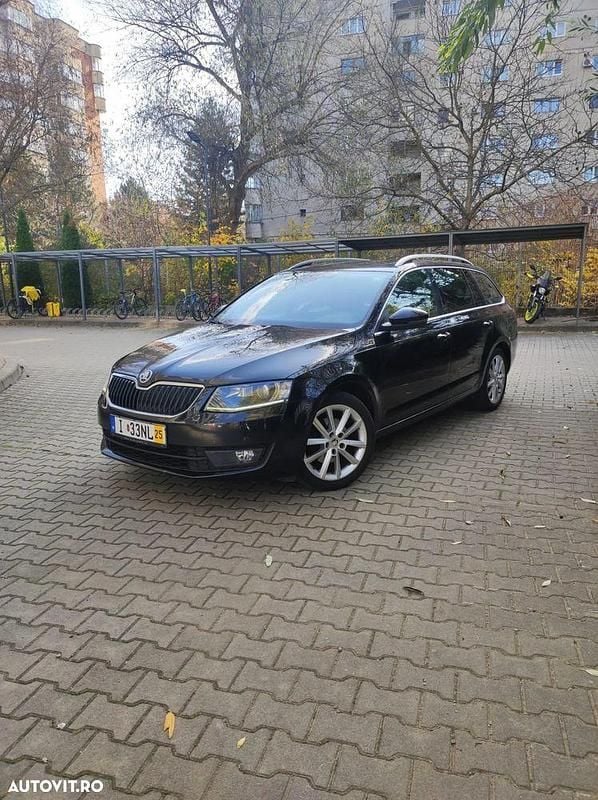 Culoarenegru Utilizat 2014 Skoda Octavia Break | 7.450 EUR (Preț OK) - Imagine 1/4
