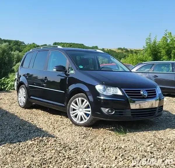 Second-hand VW Touran 170 CP (125 kW) 2008 Negru Monovolum