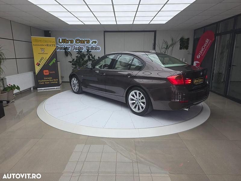 Second-hand BMW 320 Performance 184 CP (135 kW) 2012 Culoaremaro Berlinǎ