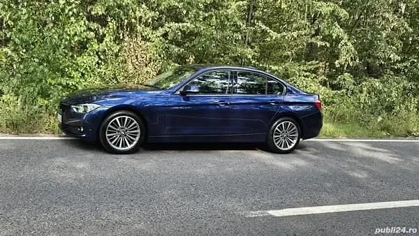Second-hand BMW 320 140 CP (102 kW) 2018 Albastru Berlinǎ