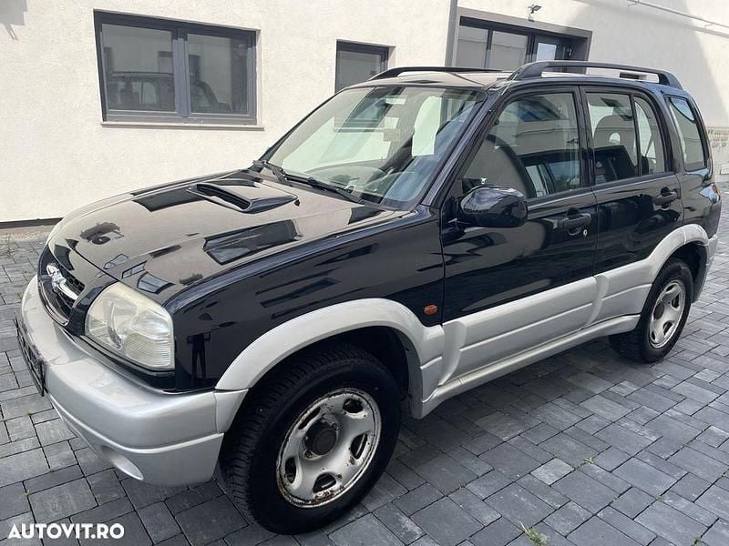 Culoareverde Utilizat 2004 Suzuki Grand Vitara SUV | 4.998 EUR (Preț OK) - Imagine 1/4