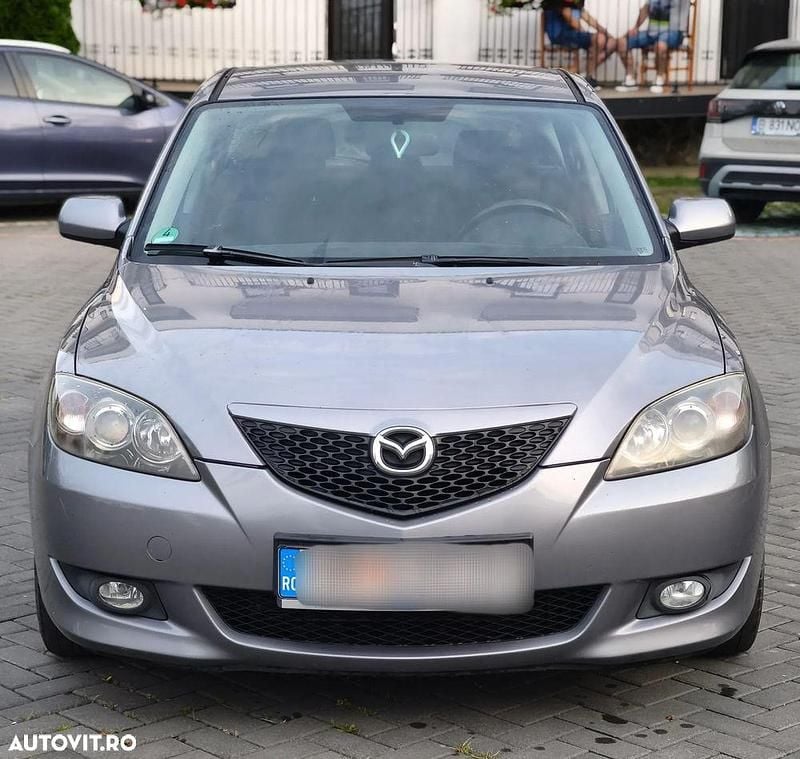 Gri Utilizat 2007 Mazda 3 Comfort Hatchback | 1.999 EUR (Preț bun) - Imagine 1/4