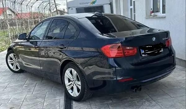 Second-hand BMW 325 Sport Line 218 CP (160 kW) 2014 Albastru Berlinǎ