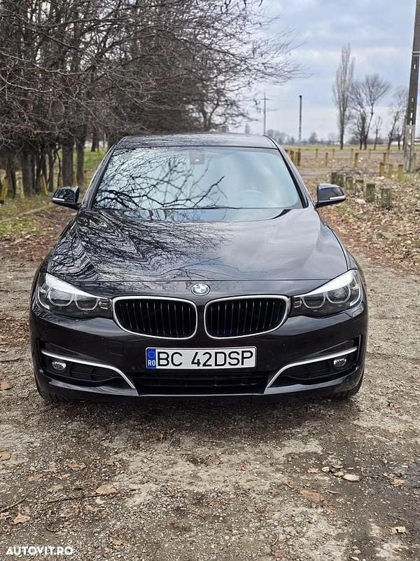 Culoarenegru Utilizat 2017 BMW 318 Gran Turismo Luxury Line Berlinǎ | 12.950 EUR (Preț bun) - Imagine 1/4