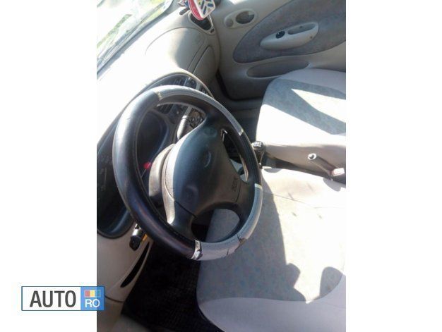 Second-hand Ford Fiesta 75 CP (55 kW) 1998 Rosu Hatchback