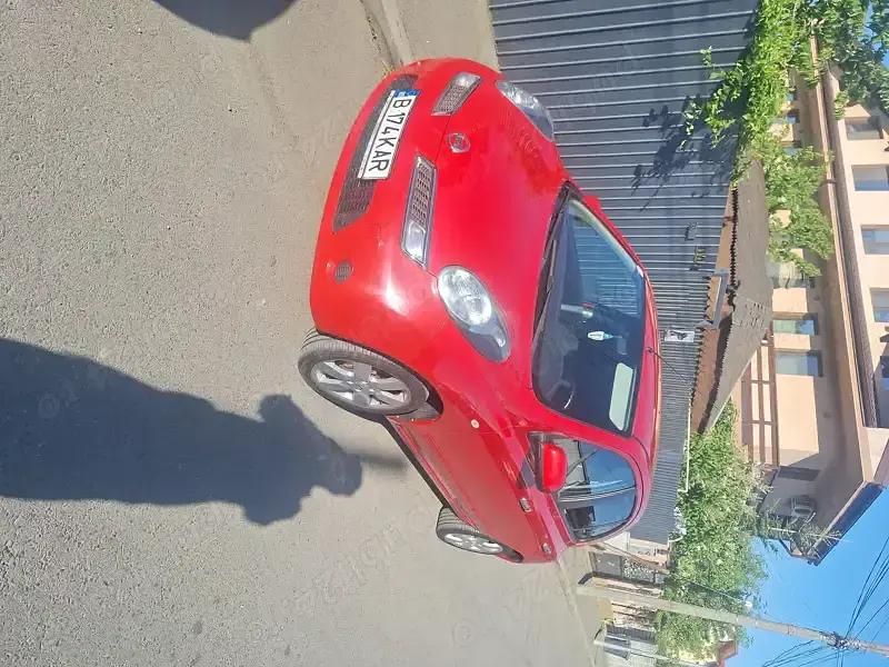 Rosu Utilizat 2010 Nissan Micra Hatchback | 3.450 EUR (Preț bun) - Imagine 1/4