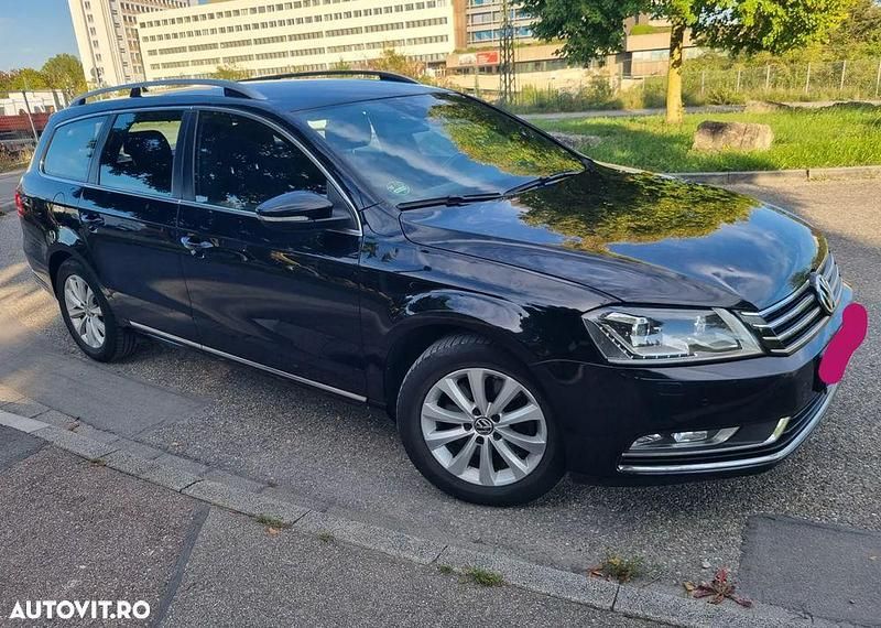 Culoarenegru Utilizat 2014 VW Passat Highline Break | 7.600 EUR (Preț bun) - Imagine 1/4