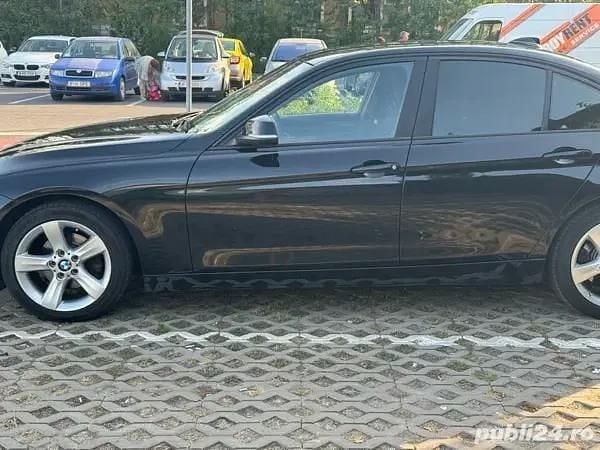 Negru Utilizat 2013 BMW 318 Berlinǎ | 7.990 EUR (Preț OK) - Imagine 1/4