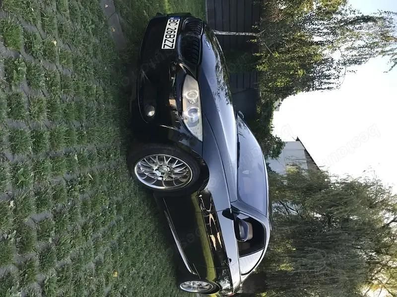 Second-hand BMW 330 Sport Line 320 CP (235 kW) 2011 Negru Coupe