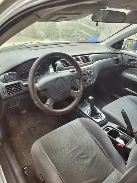 Utilizat 2004 Mitsubishi Lancer Berlinǎ | 2.200 EUR - Imagine 1/4