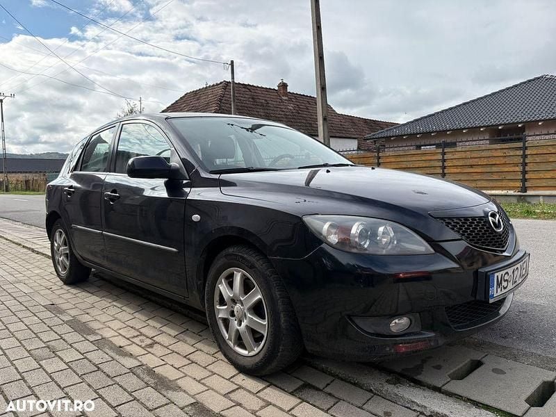 Culoarenegru Utilizat 2006 Mazda 3 Hatchback | 2.100 EUR (Preț OK) - Imagine 1/4
