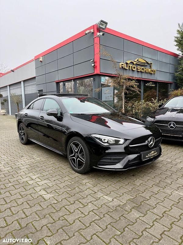 Culoarenegru Utilizat 2021 Mercedes CLA250e AMG line Berlinǎ | 28.701 EUR (Preț OK) - Imagine 1/4