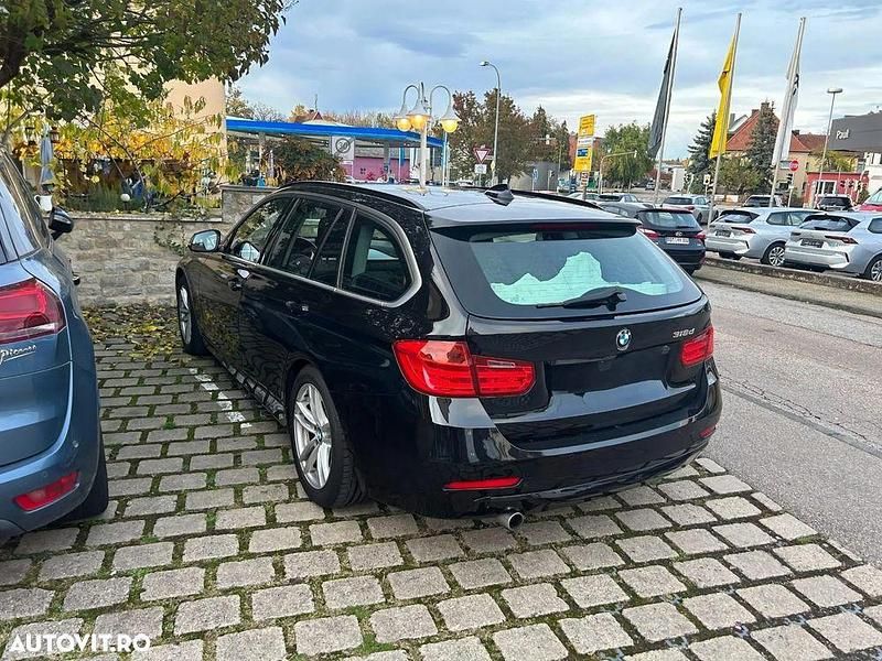 Second-hand BMW 318 Sport Line 143 CP (105 kW) 2013 Culoarenegru Break