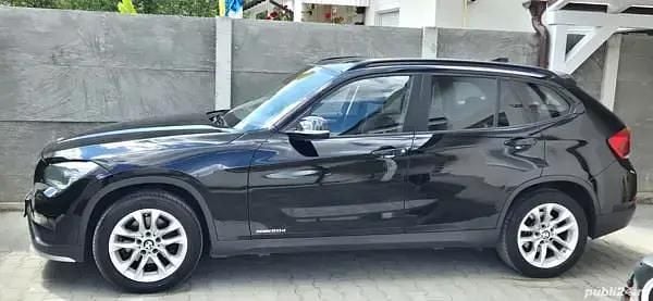 Negru Utilizat 2015 BMW X1 SUV | 11.000 EUR (Super Preț) - Imagine 1/4