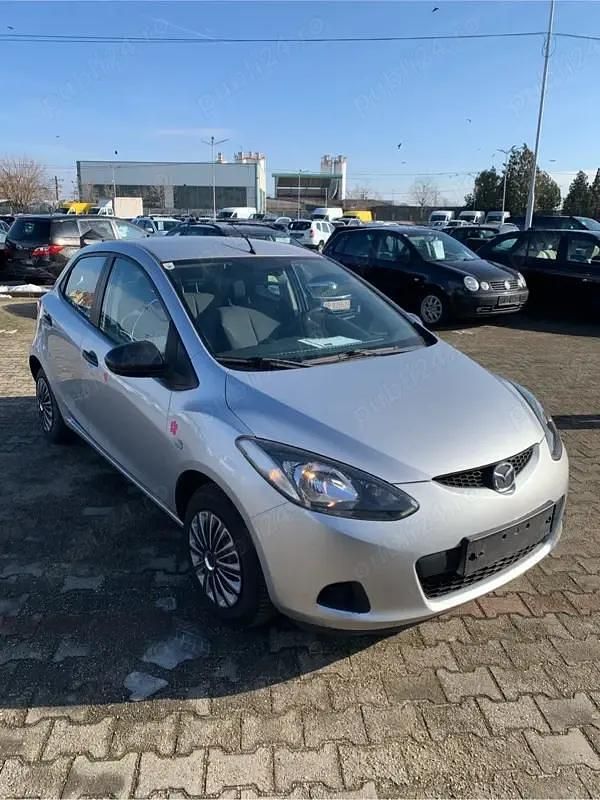 Gri Second-hand 2009 Mazda 2 Hatchback | 1.550 EUR (Super Preț) - Imagine 1/4