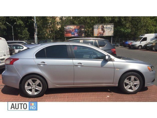 Gri Utilizat 2009 Mitsubishi Lancer Hatchback | 5.600 EUR - Imagine 1/4