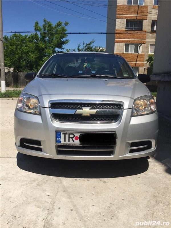 Second-hand Chevrolet Aveo 84 CP (61 kW) 2011 Argintiu Berlinǎ