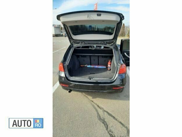 Second-hand BMW 318 Comfort Edition 143 CP (105 kW) 2014 Negru Break