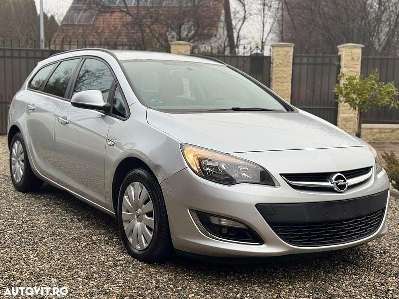 Second-hand Opel Astra Edition 95 CP (69 kW) 2013 Culoareargint Break