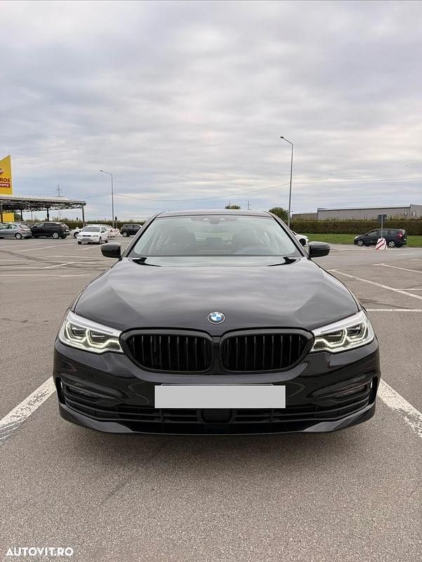 Culoarenegru Utilizat 2018 BMW 520 Berlinǎ | 24.500 EUR (Puțin scump) - Imagine 1/4