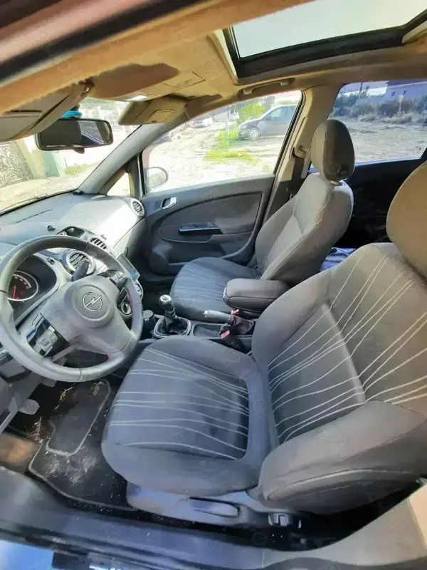 Second-hand Opel Corsa Enjoy 75 CP (55 kW) 2007 Albastru marin Hatchback