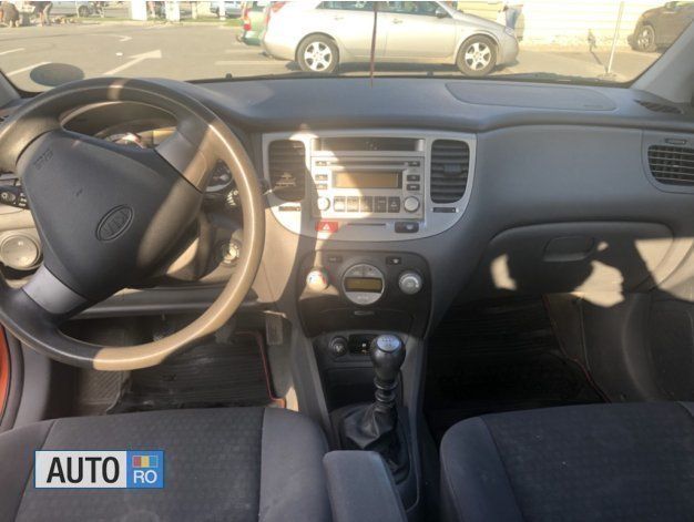 Second-hand Kia Rio 110 CP (80 kW) 2006 Portocaliu Berlinǎ