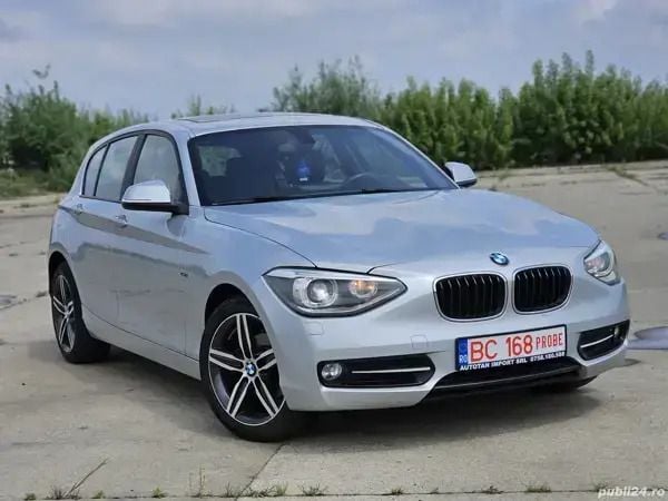 Argintiu Utilizat 2013 BMW 114 Hatchback | 7.650 EUR - Imagine 1/4