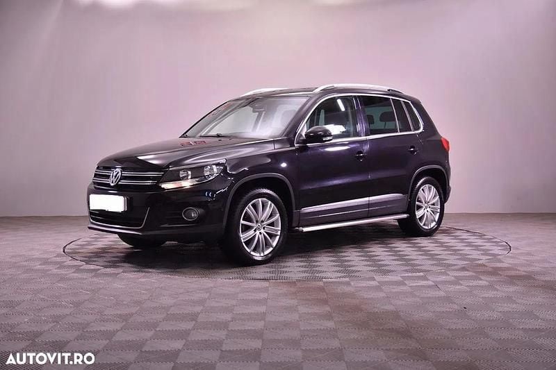Culoarenegru Utilizat 2014 VW Tiguan Sportline SUV | 14.200 EUR (Preț bun) - Imagine 1/4