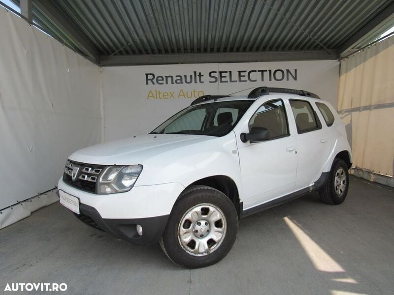 Alb Utilizat 2014 Dacia Duster Lauréate SUV | 6.499 EUR (Preț OK) - Imagine 1/4