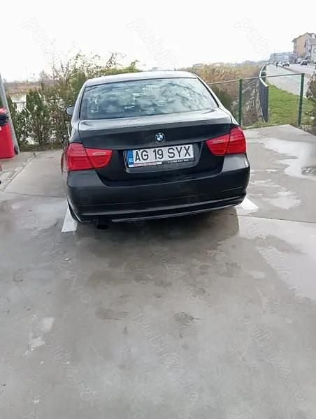 Second-hand BMW 318 143 CP (105 kW) 2010 Negru Berlinǎ