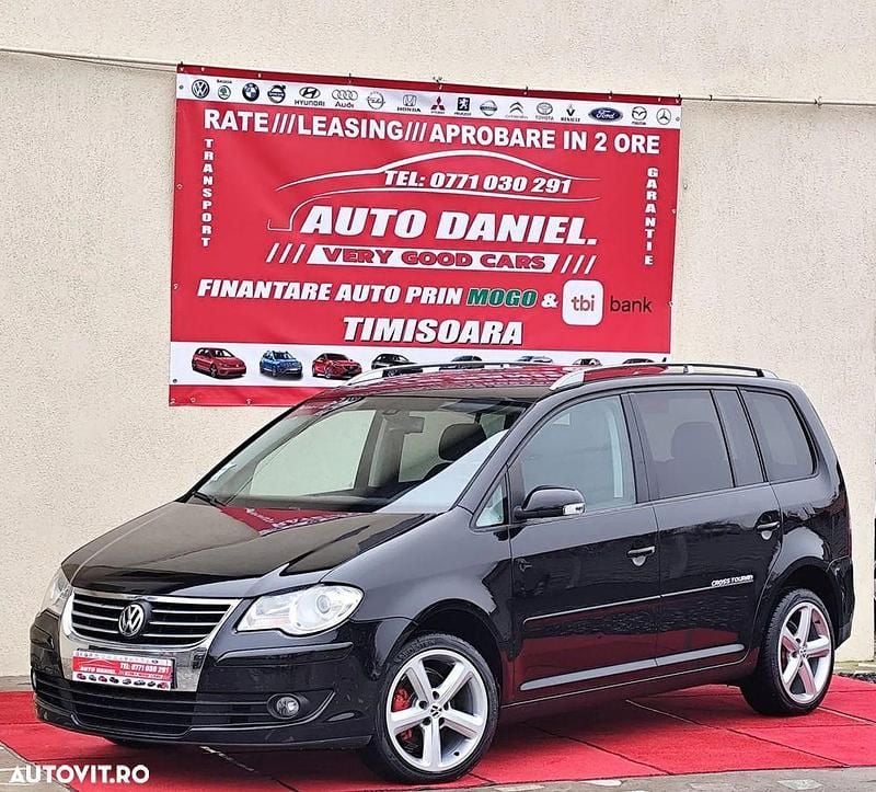 Second-hand VW Touran 105 CP (77 kW) 2009 Culoarenegru Monovolum