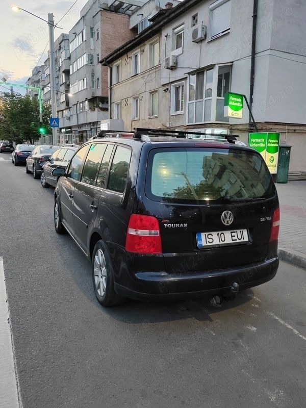 Second-hand VW Touran 140 CP (102 kW) 2006 Negru Monovolum
