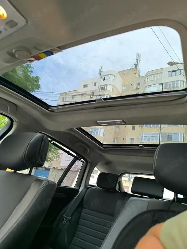 Second-hand Renault Laguna III Black Edition 110 CP (80 kW) 2011 Negru Break