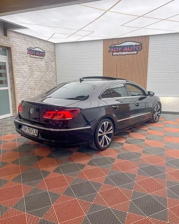 Second-hand VW Passat R 140 CP (102 kW) 2012 Negru Berlinǎ