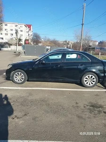 Second-hand Mercedes C200 134 CP (98 kW) 2009 Negru Berlinǎ