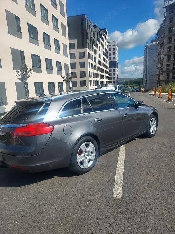 Second-hand Opel Insignia Sport 160 CP (117 kW) 2010 Gri Break