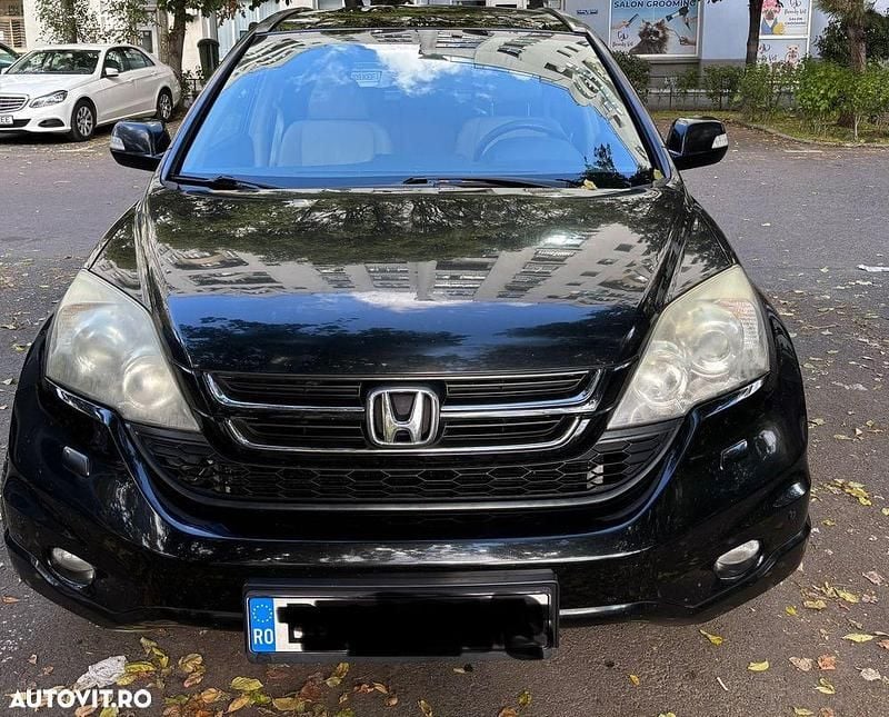Culoarenegru Utilizat 2011 Honda CR-V Executive SUV | 8.500 EUR (Preț OK) - Imagine 1/4