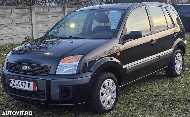 Culoarealbastru Utilizat 2006 Ford Fusion Monovolum | 1.999 EUR (Puțin scump) - Imagine 1/4