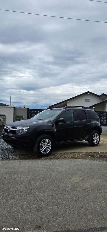 Culoarenegru Utilizat 2013 Dacia Duster Ambiance SUV | 6.690 EUR (Preț bun) - Imagine 1/4