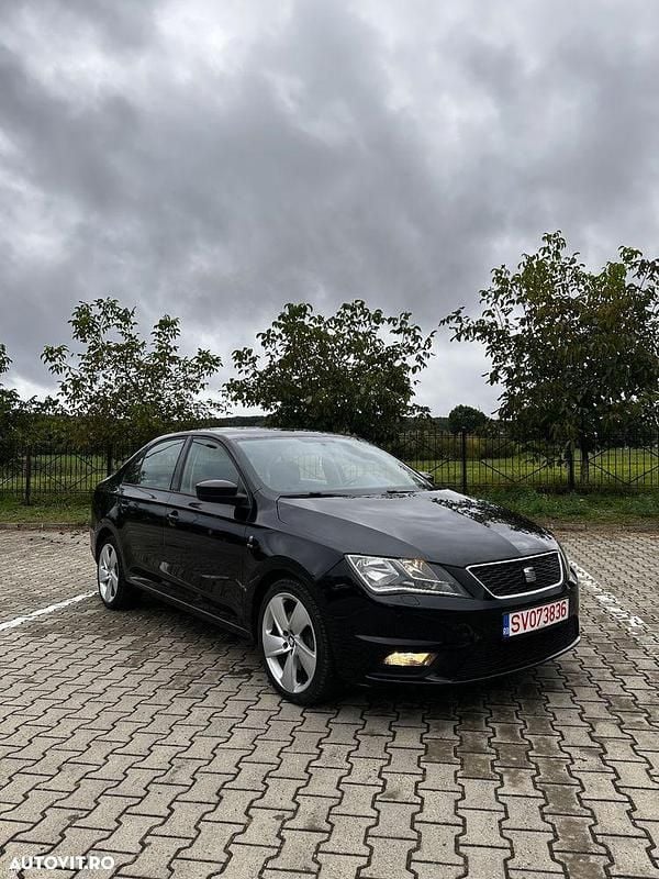 Culoarenegru Utilizat 2013 Seat Toledo Style Berlinǎ | 6.200 EUR - Imagine 1/4