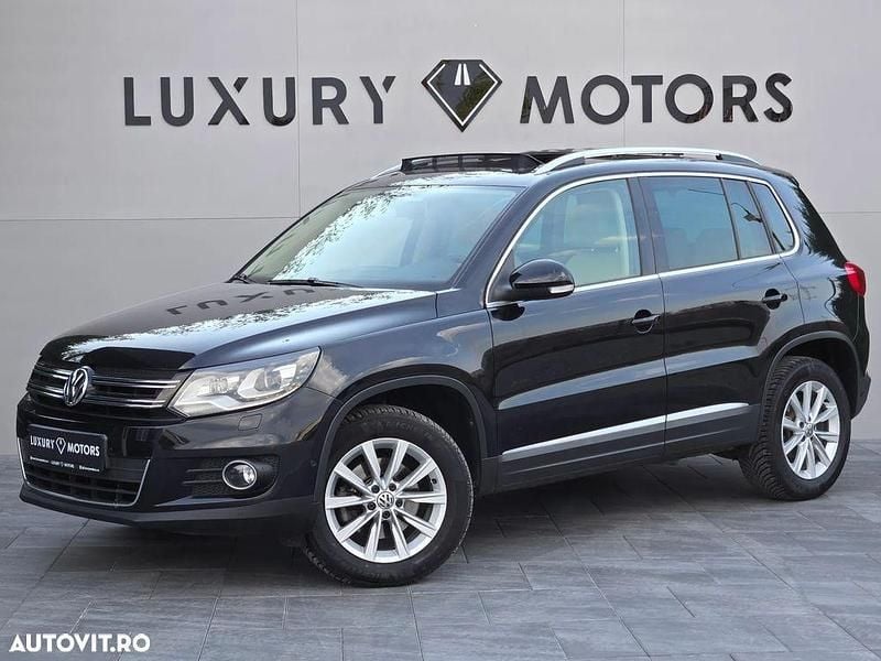 Culoarenegru Utilizat 2013 VW Tiguan Sportline SUV | 11.800 EUR (Preț OK) - Imagine 1/4