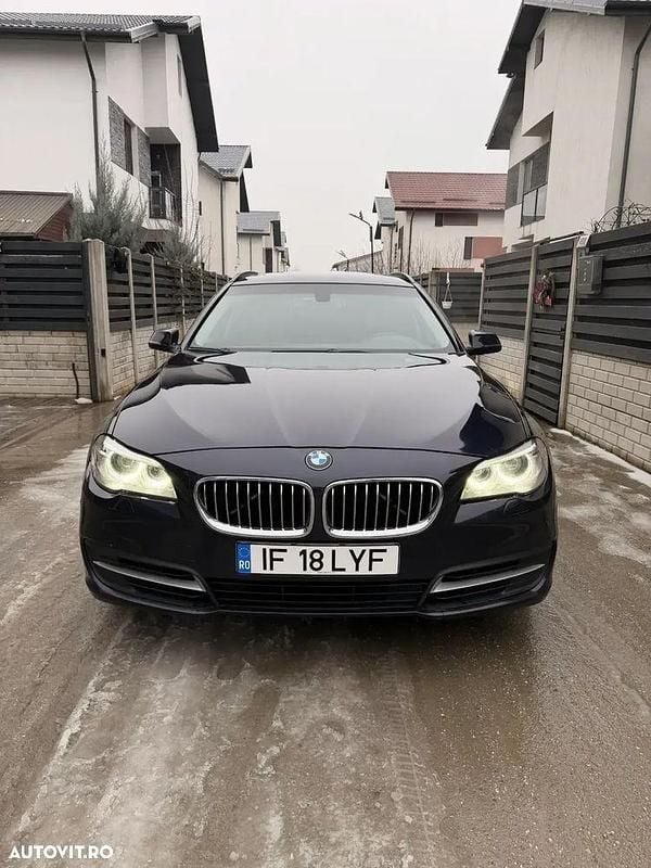 Culoarealbastru Second-hand 2016 BMW 518 Break | 12.900 EUR (Preț bun) - Imagine 1/4