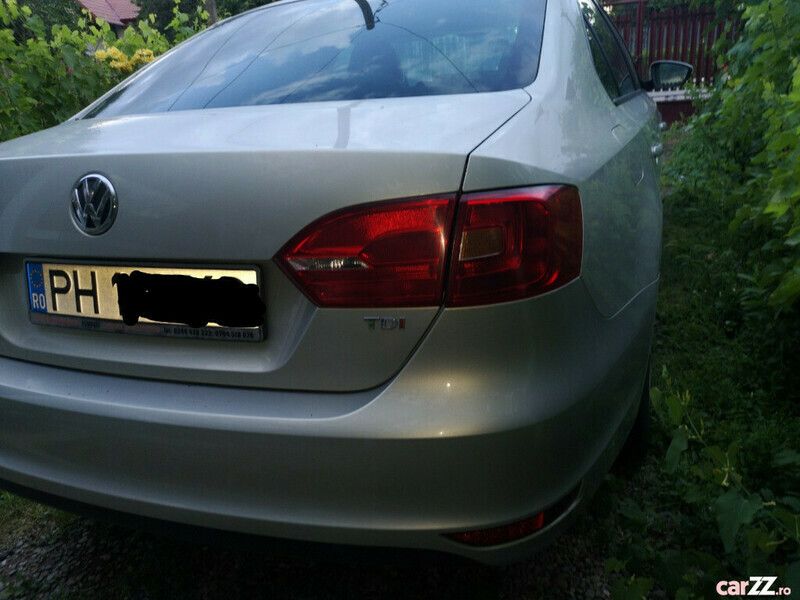 Second-hand VW Jetta 105 CP (77 kW) 2011 Argintiu Berlinǎ