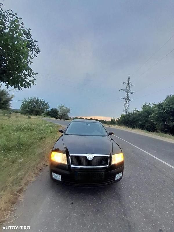 Culoarenegru Utilizat 2006 Skoda Octavia Classic Berlinǎ | 2.700 EUR (Preț OK) - Imagine 1/4