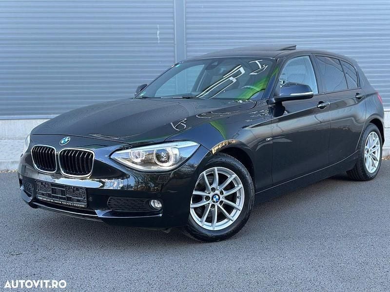 Culoarenegru Utilizat 2014 BMW 120 Sport Line Hatchback | 12.450 EUR - Imagine 1/4