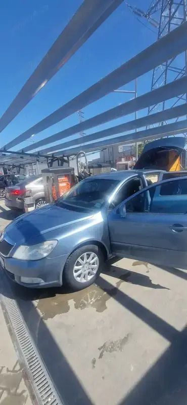Utilizat 2010 Skoda Octavia Berlinǎ | 2.800 EUR (Preț bun) - Imagine 1/4