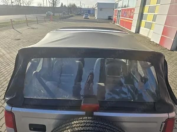 Second-hand Suzuki Jimny 80 CP (58 kW) 2003 Auriu SUV